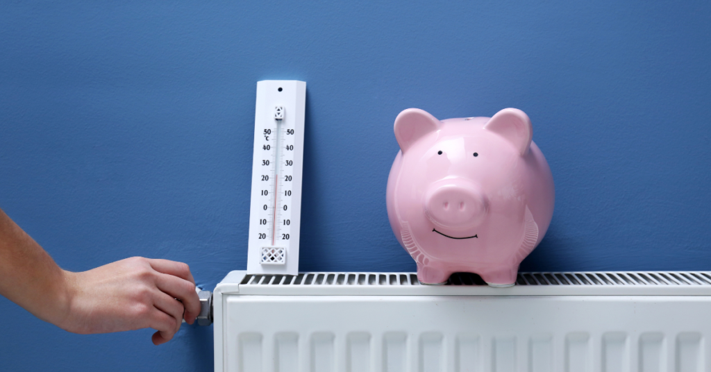 a piggy bank on a radiator symbolising saving money with home insulation