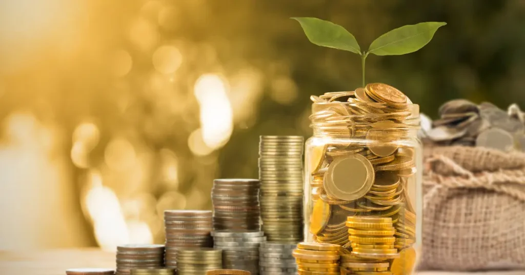 a jar of money with a plant shoot symbolising eco grants